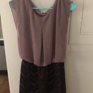 A light purple, black zigzagged designed dress.